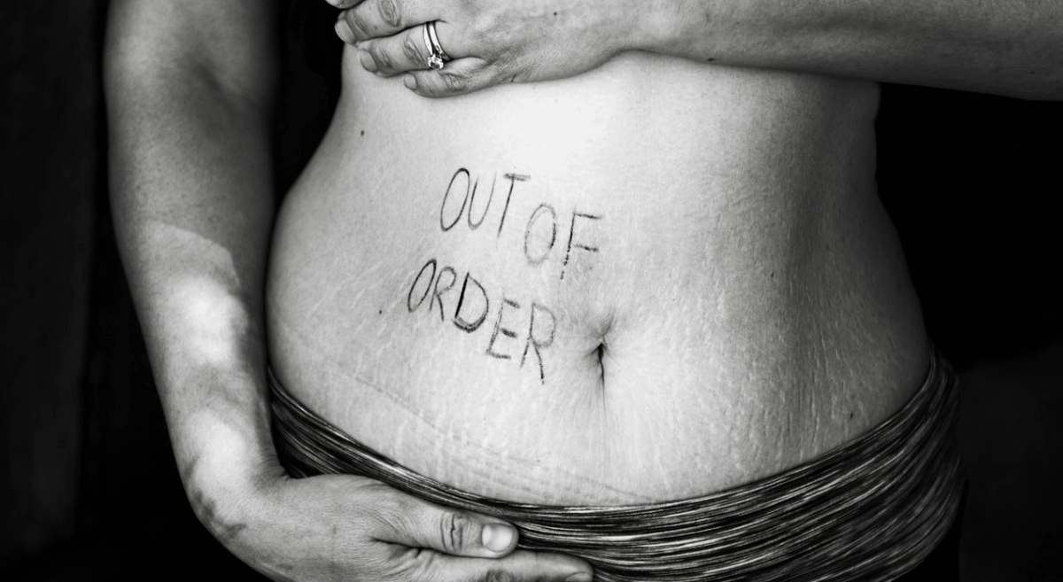 stomach with out of order sign